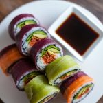 Need a quick snack or a healthy lunch option on the go? Our Veggie Sushi Rolls are easy to prepare and make for the perfect portable meal! With a variety of fillings and the option to dip in savory soy sauce, these rolls are as versatile as they are delicious. Excited to learn how to make these delightful sushi rolls? Let’s get rolling!