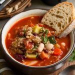 Elevate your soup game with Rustic Vegetable and Quinoa Minestrone, where tradition meets modern simplicity. This recipe blends colorful vegetables and quinoa into a tasty, nutritious masterpiece that’s ideal for any occasion. Looking to savor a bowl of nature’s finest bounty? Discover how to create this nourishing soup today!