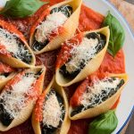 Elevate your dining experience with our Spinach and Ricotta Stuffed Shells: A Delicious Italian Classic! In addition to the recipe, delve into perfect pairing options like garlic bread, fresh salads, or a glass of red wine that can enhance your meal. Create a delightful Italian dinner that transforms any occasion into a celebratory feast, filled with laughter and great food!