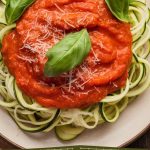 Transform your dinner routine with Zucchini Noodles and Tomato Basil Sauce, a dish that celebrates simplicity and freshness. This recipe invites creativity, allowing you to add your favorite vegetables and proteins, making it a versatile choice for any palate and a delightful addition to your culinary repertoire.