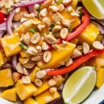 Discover the art of balancing flavors with this Spicy Thai Mango Salad. The contrasting sweetness of the mango and the crunchiness of peanuts, all brought together by a tangy lime dressing, create a mouthwatering experience you won’t want to miss.