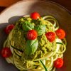 Perfect for busy weeknights or a quick lunch, Zucchini Noodles with Avocado Pesto can be whipped up in minutes. Get ready to enjoy a wholesome, delicious meal that's as beautiful to look at as it is delightful to eat!