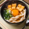 Explore the versatility of Kitsune Udon, ideal for any occasion, whether it’s a cozy night in or an impressive dish to share with friends. With each bowl, you’ll enjoy not just a meal, but a journey through the heart of Japanese cuisine.