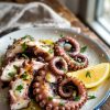 Explore variations that bring new life to this classic dish, from spicy marinades to creative sides. Whether served as an appetizer or a main course, grilled octopus with lemon and herbs is a flavorful journey that will transport your palate to the Mediterranean coast.
