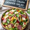 Dive into layers of flavor with our guide to the perfect chopped Italian grinder salad, where crunchy, tangy, and savory come together for a delicious twist on a deli classic.