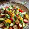 Bring new life to your table with the bold tastes and textures of charred corn, ripe avocado, and rustic croutons tossed in a bright, lively dressing.