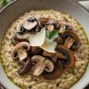 Complete your culinary journey with Parmesan cheese and fresh herbs that add the finishing touch to this unforgettable dish. Discover how to make Mushroom Risotto with Truffle Oil a staple in your kitchen, bringing an air of elegance to your dining table.