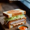 Join us on a culinary journey as we explore the history of Katsu Sando and its rise to global fame. Embrace the joy of making this delightful dish at home, where every bite tells a story of tradition and innovation.