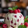 Experience the perfect blend of rich white chocolate and tangy raspberry in a dessert that redefines traditional cheeseballs. This recipe not only delivers on taste but also gives you a visually striking centerpiece for your dessert table, making it a perfect choice for celebrations and gatherings.